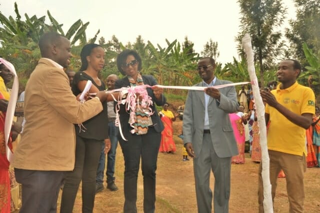 Cutting the ribbon from left to right Tona Isibo Global Communities representative Beatrice Umwiza IM Representative Innocent Benineza DUHAMIC Executive Secretary DUHAMIC – ADRI