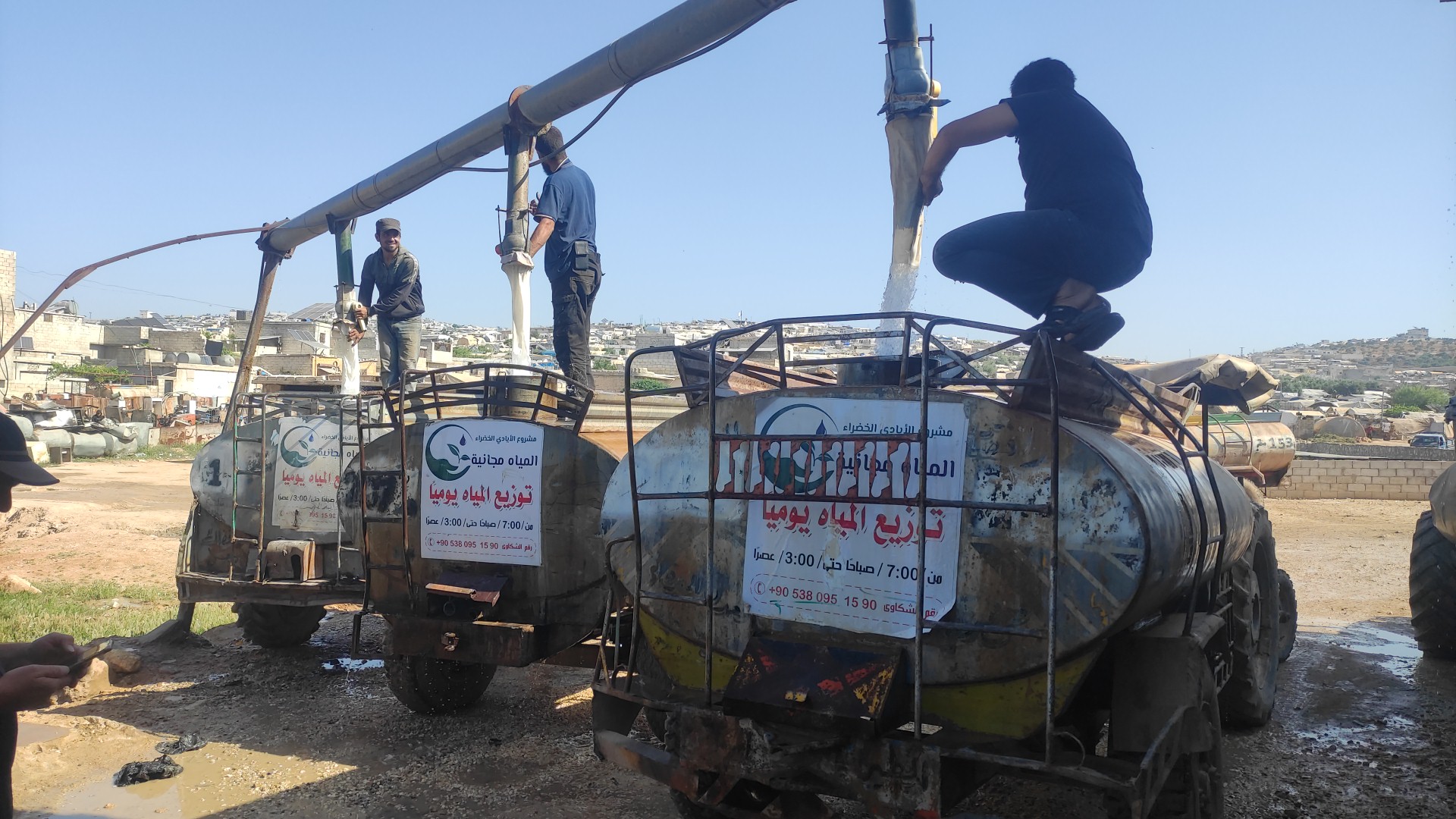 Following up filling Drinking Watre Tanks form Al-Nour Borehole in Atma Camps-Photogrpher Omar Al-Khattab-Program Wash- Date May 22 2024
