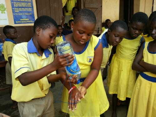 Children-of-Jumapo-Methodist-School-Washing-their-hands-with-a-tippy-tap-Credit-Peter-Serinye