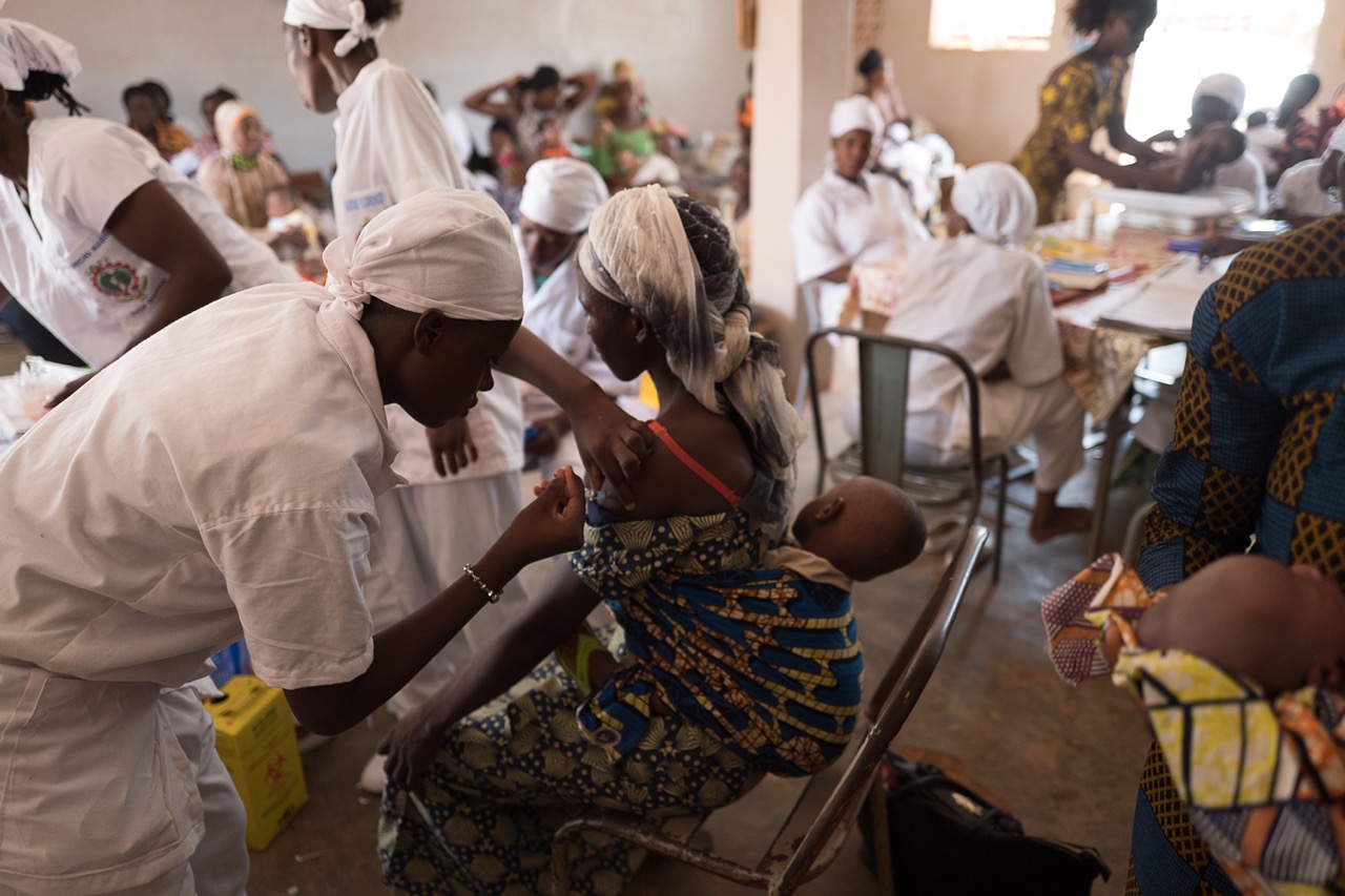 Scenes of FP counseling sessions and and an implant insertion at the CSPS Dassasgho in Ouagadougou