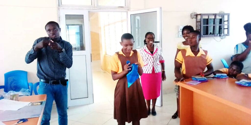 A-visually-impaired-girl-demonstrating-the-use-of-Be-Girl-PeriodPanties-with-sign-language-interpretaion